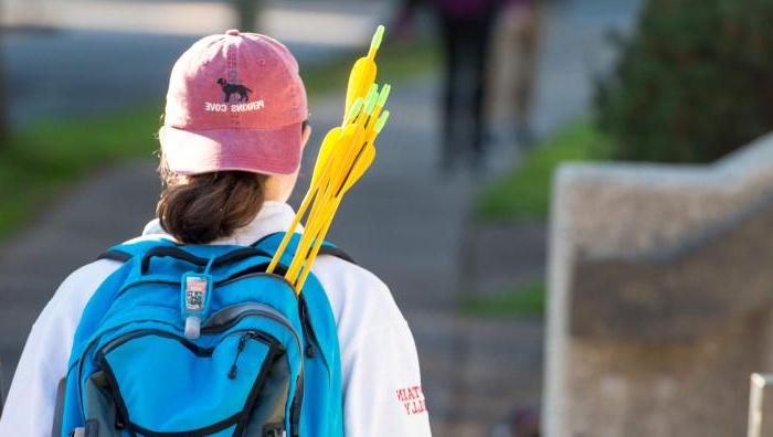 Student with arrows in their backpack.